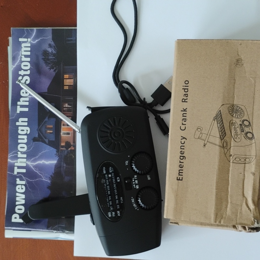 Black Emergency Crank Radio with flashlight